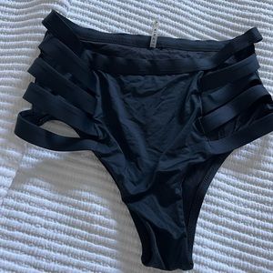 Vitamin A swimsuit bottoms with side cut outs